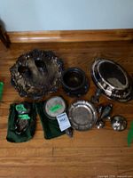 Group shot of all silver items on floor