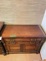 Front and top view of buffet showing drawers, doors, hardware, finish