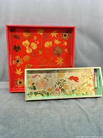 Front view of both trays showing patterns and sizes