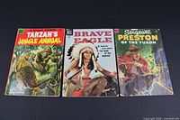 Front covers of all three comics