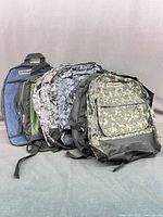 Group of six backpacks assorted colors