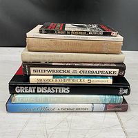 Stack of all seven maritime books, spines visible