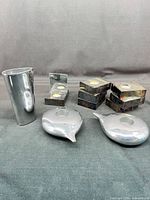 All items together: vase, two teardrop votives, six rectangular holders, mirrored double holder