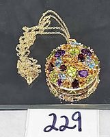 Pendant and chain overall view with lot tag visible