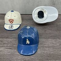 Underside of one bottle opener showing “LOYAL PRODUCTS BOTTLE OPENER” casting