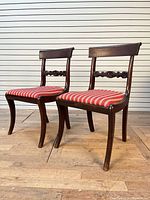 Pair of Empire style side chairs angled view
