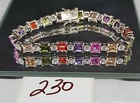 Full bracelet showing multicolour stones and clasp