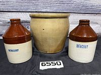 Group shot: two mercury jugs and one crock