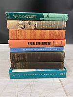 Stack of seven vintage history and naval books