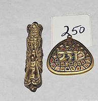 Front view showing mezuzah case and pendant together