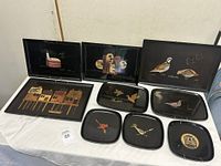 Overview of all eight Couroc pieces laid out