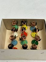 Twelve painted wooden angel candle holders arranged in original box
