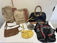 Group shot showing all eight bags