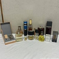 Group shot of all perfume items lined on table