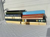 Entire stack of yearbooks on table