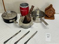 Group shot showing all kitchenware items on table