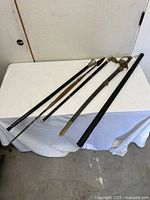 All four items laid out on table showing full length