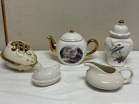 All five porcelain/ceramic pieces together