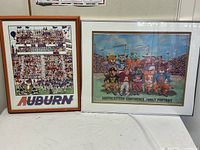 Both framed SEC prints side by side