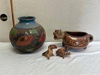 Group shot of vase, animal bowl, snake and turtle figurines