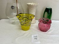 Front view of all five vases and bowls