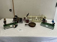 Overall view of both golfer banks, horse-drawn wagon with three horses and skillet