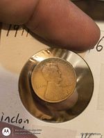 Obverse of 1911 Lincoln Wheat cent in flip