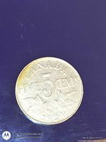 Reverse of 1924 Canada 5-cent coin showing denomination and date