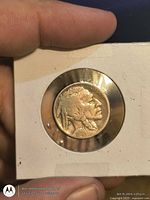 Obverse of 1928 Buffalo Nickel in holder