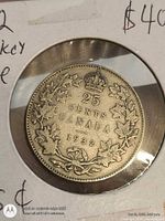 Reverse of 1932 25-cent coin showing denomination, wreath and crown