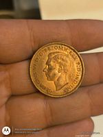 Obverse showing George VI portrait and lettering GEORGIVS VI D:G:BR:OMN:REX F:D:IND:IMP