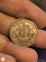 Reverse side with Golden Hind ship and 1946 date