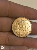 Reverse showing crowned coat of arms, denomination and date 1970