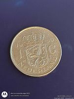 Obverse showing crowned lion shield and 1 G denomination with date 1980