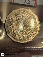 reverse of 1975 Australian 50 cent coin showing coat of arms