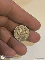 Obverse view of worn Spanish coin with rider, ESPAÑA text, date