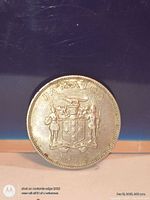 Obverse showing Jamaica coat of arms and date 1975