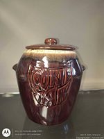 Front view showing raised "COOKIE JAR" lettering and glaze
