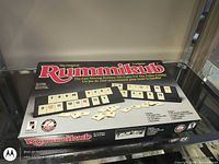 Closed Rummikub game box showing top graphics and title