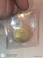 Front of sealed 2000 Sacagawea dollar showing reverse eagle design