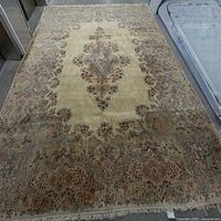 Full view of rectangular hand-knotted Persian Kerman wool rug