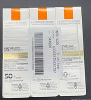 Front of three sealed boxes showing product name and SPF rating