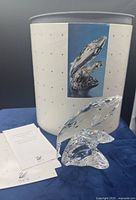 Figurine with box and papers