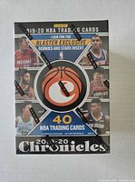 Front of sealed 2019-20 Panini Chronicles NBA blaster box showing 40 cards, Rookies & Stars insert promo, wrapped in Panini tape