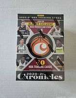 Front of sealed 2020-21 Chronicles NBA blaster box showing season, 40 cards, and blaster exclusive text