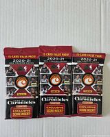 Front view of three sealed 2020-21 Panini Chronicles NBA value packs