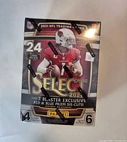 Front of sealed 2021 Panini Select NFL blaster box showing 24 cards per box