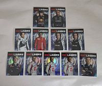 Front view of all eleven Redliners cards displaying driver images and Redliners logo