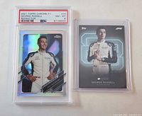 Front view of both cards, PSA slab on left, Lights Out card on right