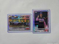 Fronts of both Fernando Alonso Purple Checker Flag cards